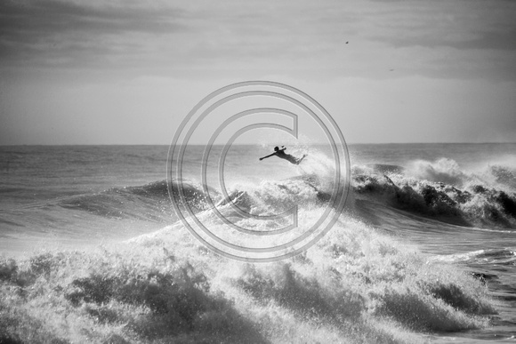"FLY" - 17x10.75  Oct 2015 A surfer launched off the back of a wave after a nice ride.