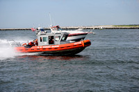 Crew was administering CPR to victim while racing through Barnegat Inlet (8/4/13)
