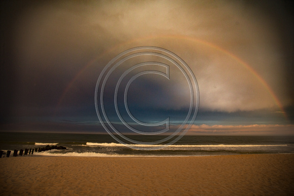 Fog-bow.   Rainbow about to be engulfed by a dog bank in Bay Head, NJ.